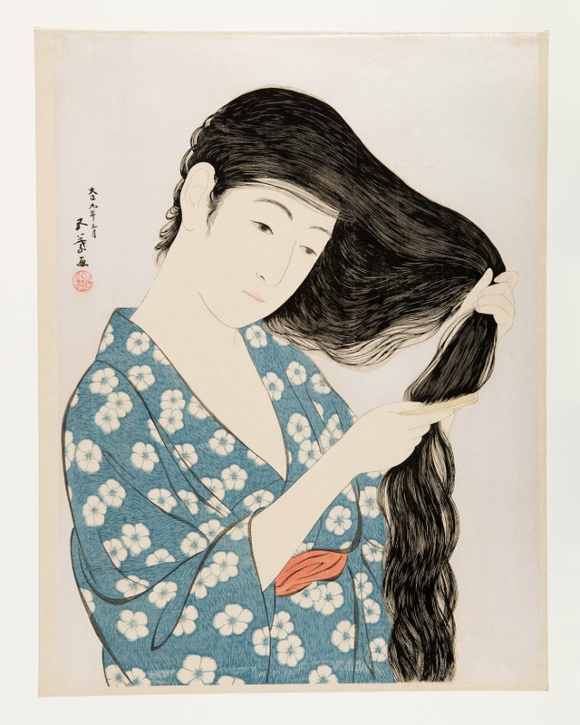 Månadens bild, kvinna som kammar håret